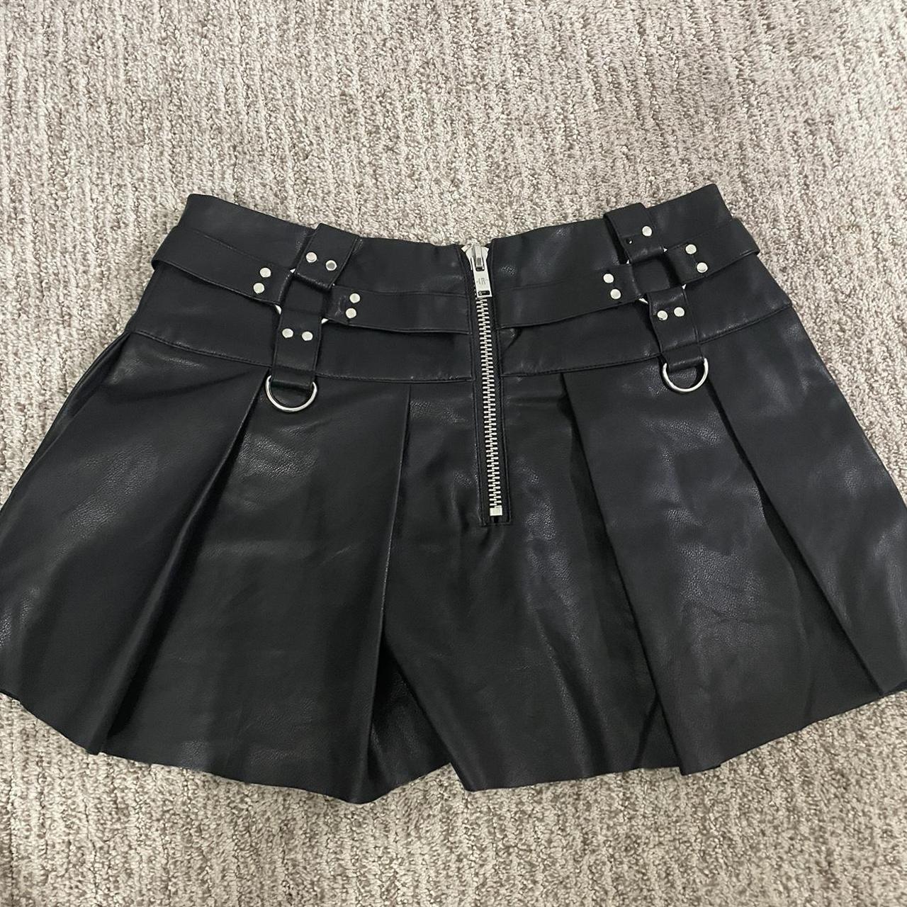 Doll’s Kill short black pleather skirt with metal... - Depop