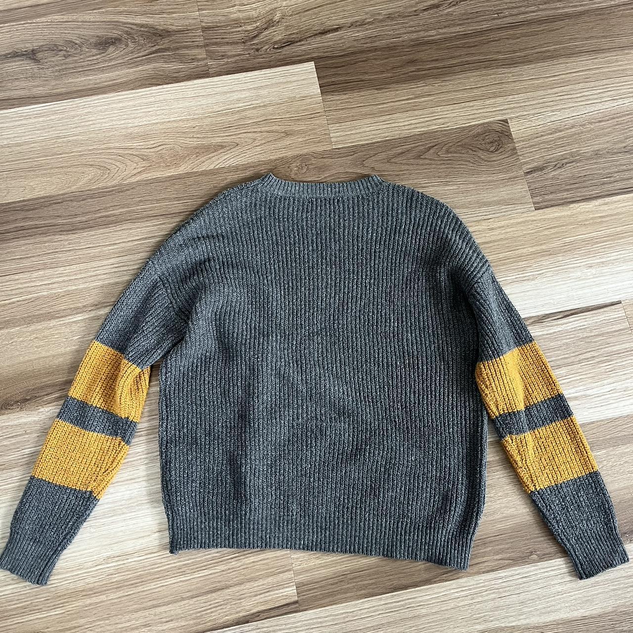 Grey and 2024 yellow jumper