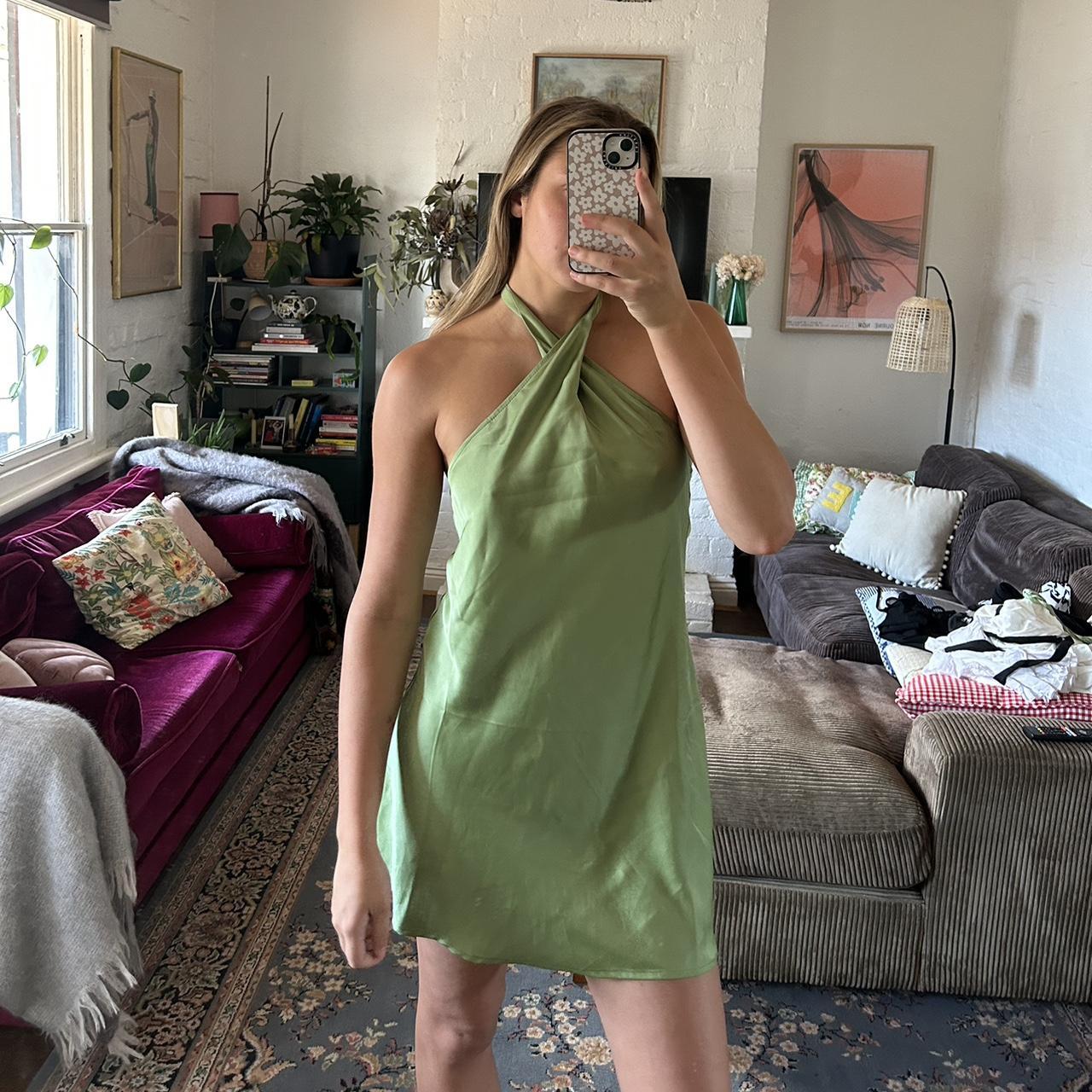 Green satin halter mini dress with open back. On a... - Depop