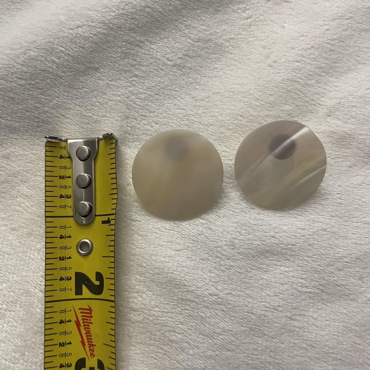 Circle earrings / looks like shell like material... - Depop