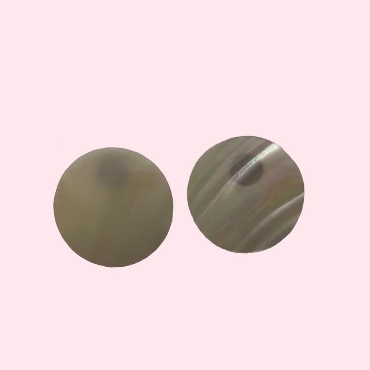 Circle earrings / looks like shell like material... - Depop