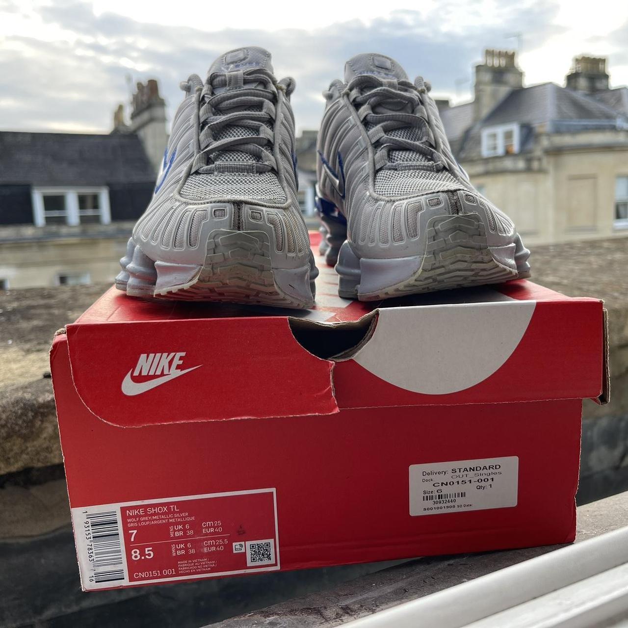 grey and blue nike shox