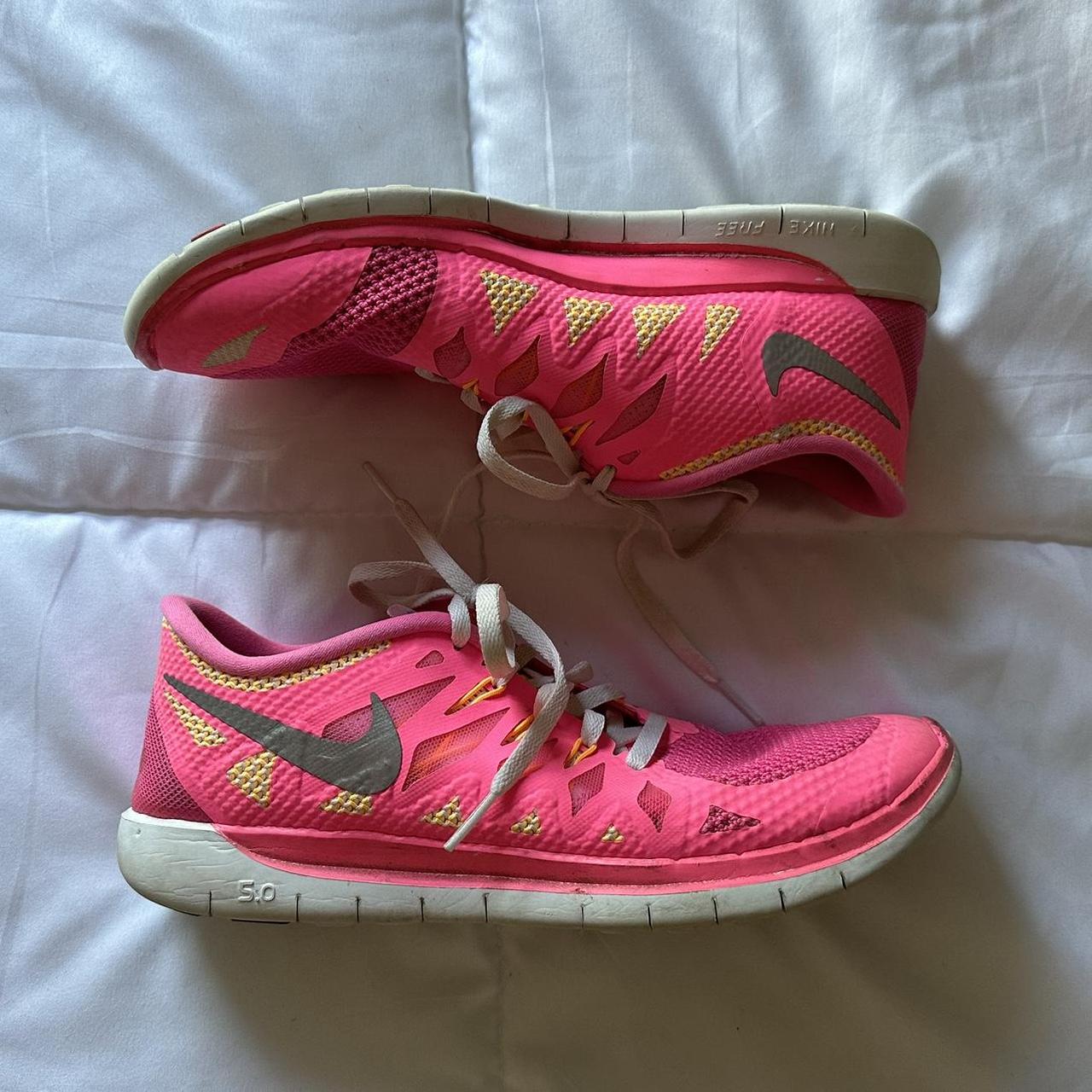 womens pink nike free runs