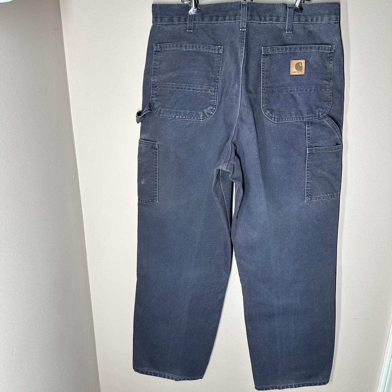 Dark grey carhartt pants (canvas). Slight fade y2k... Depop