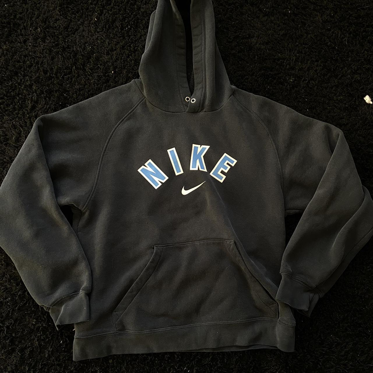 Vintage Nike hoodie dark blue, the lighting makes... - Depop