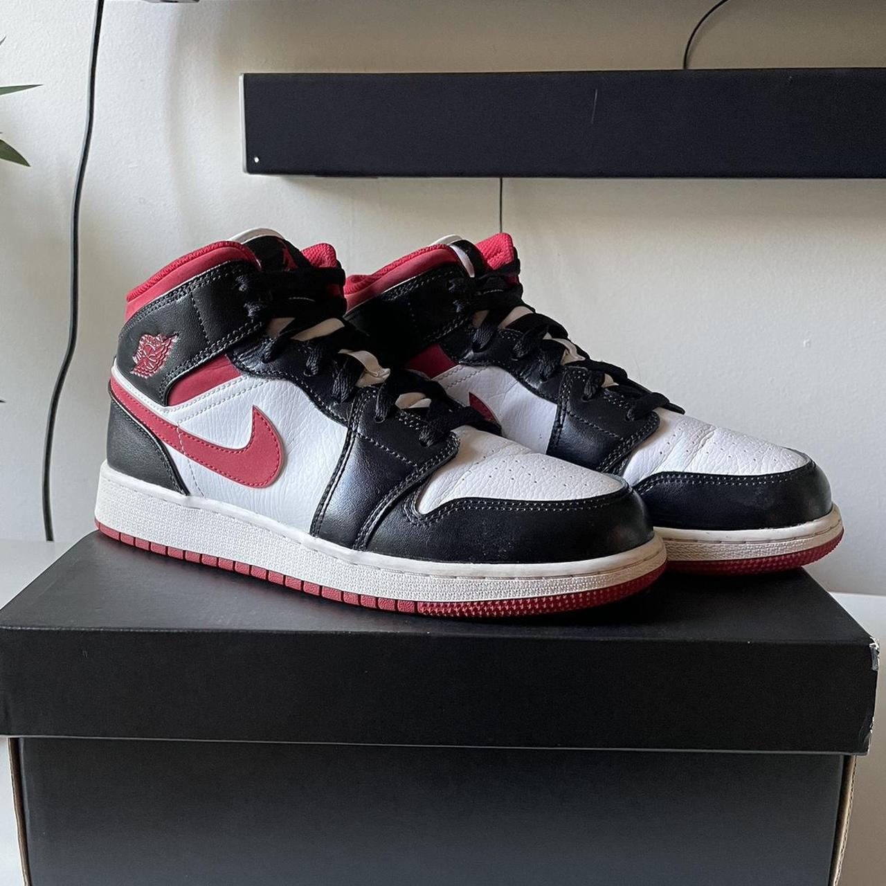 red black and white jordan 1