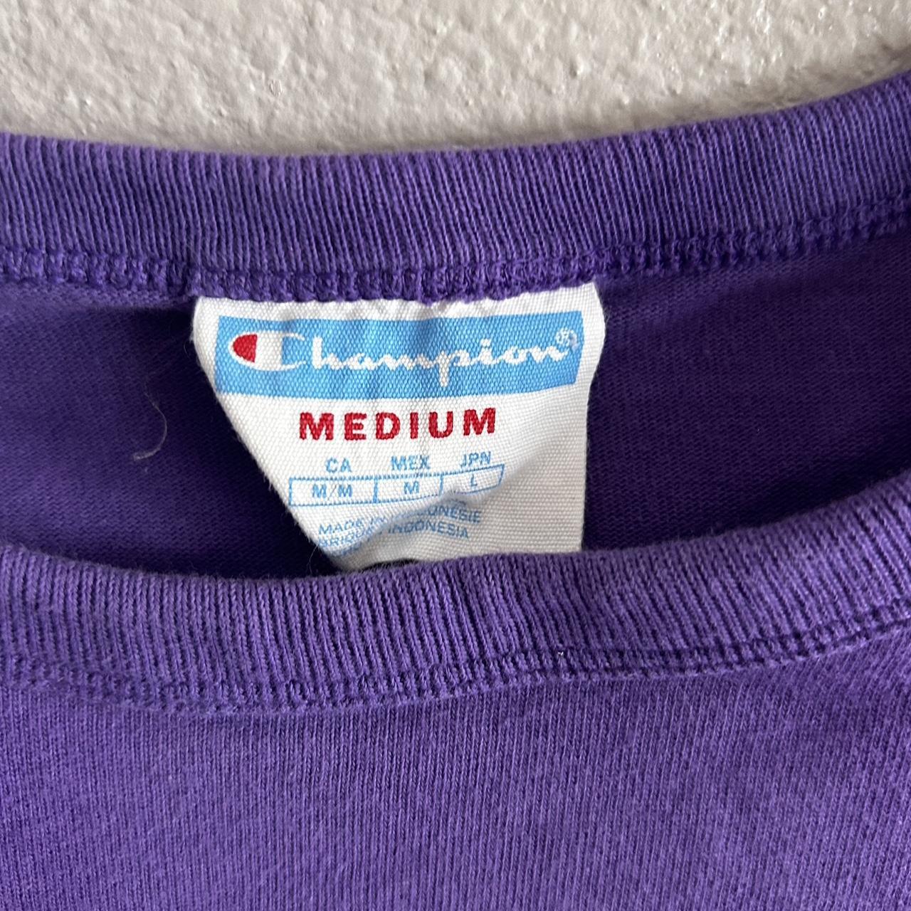 “Champion Purple Logo T-Shirt - Size M Elevate your... - Depop