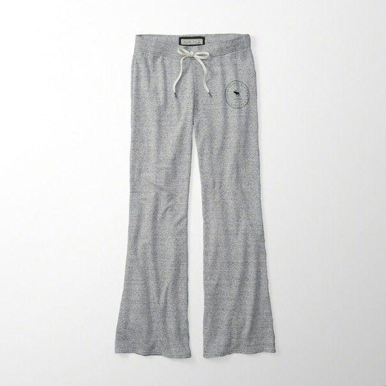 Grey flare sweatpants with drawstring waist and. Depop