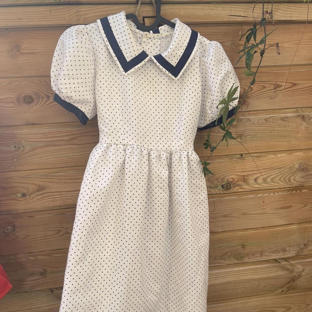 babydoll polka dot dress with collar and buttons on... - Depop