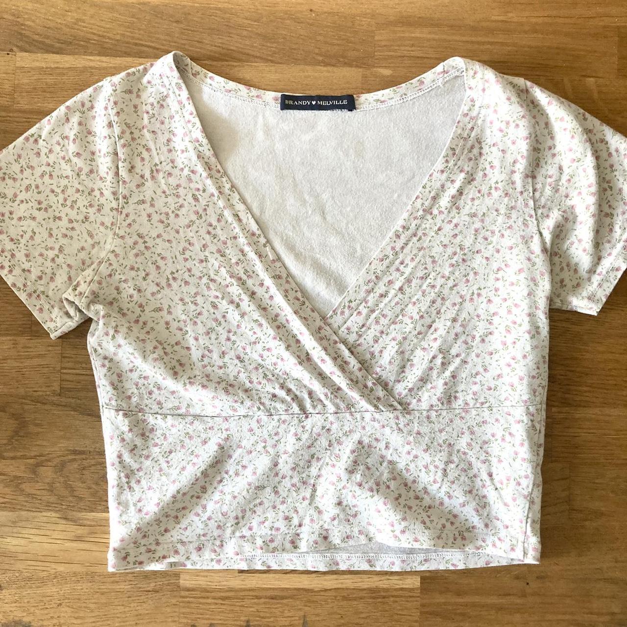 Brandy melville amara top White with pink... Depop