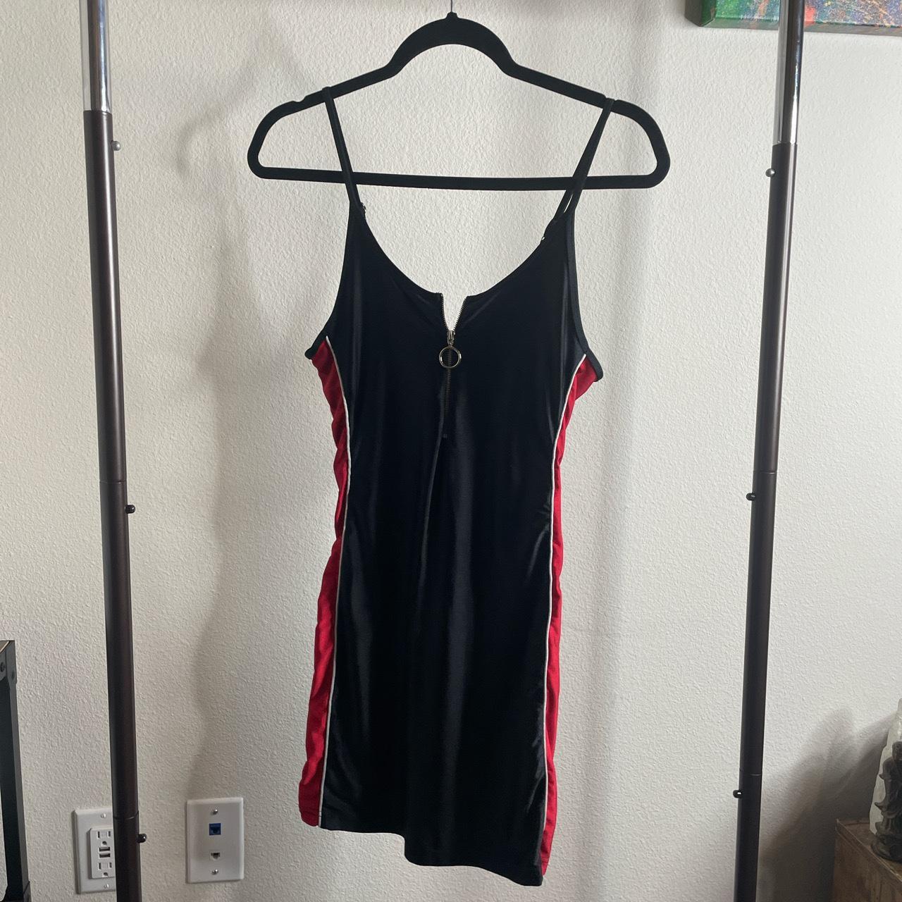 Black dress with red shop stripe down the side