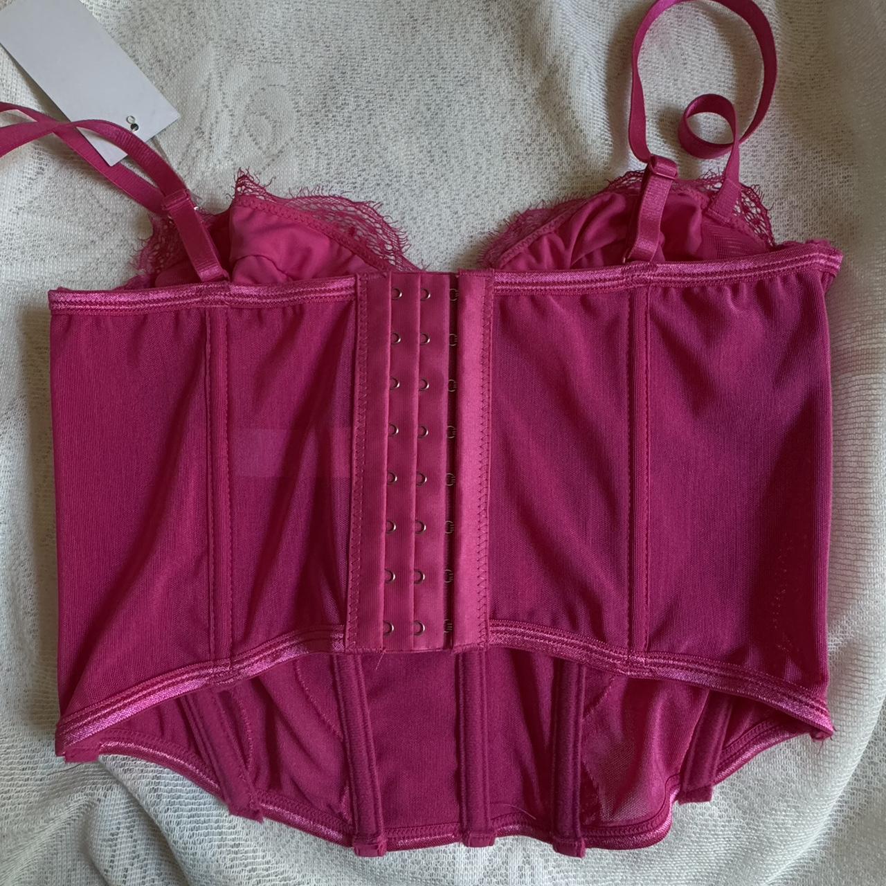 Hot pink corset top with boning Still has tag... - Depop