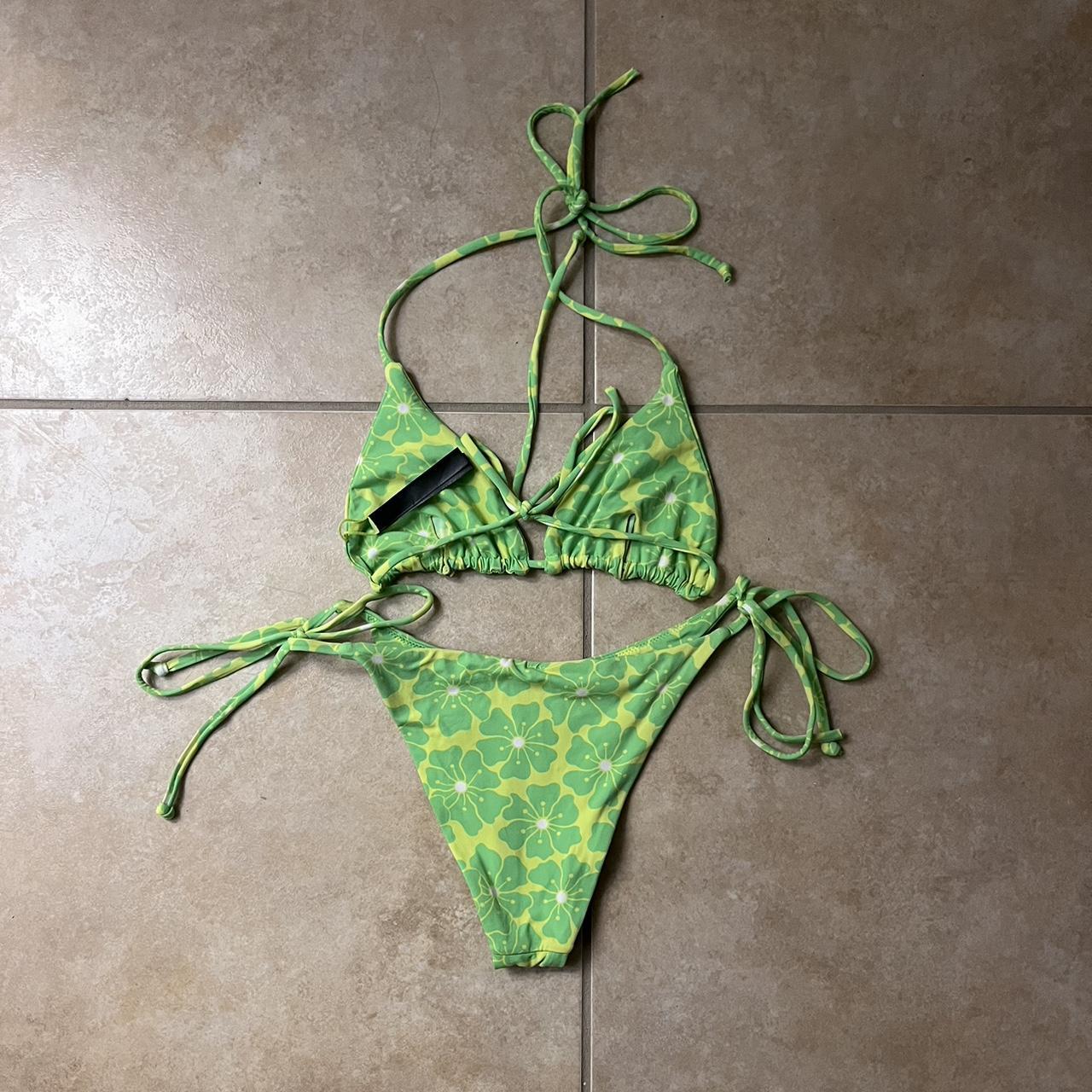 Bright green, floral bikini from Urban... Depop