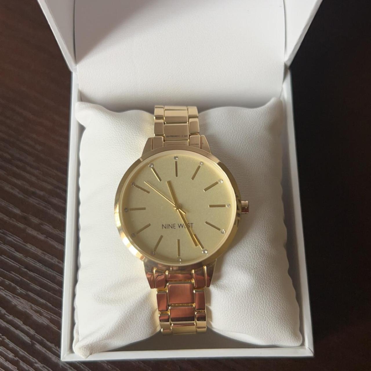 Nine West gold watch with white face Never worn . Depop