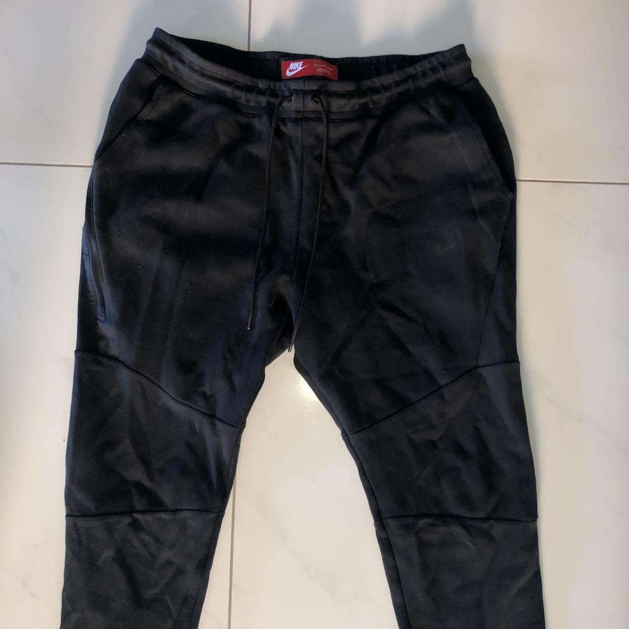 nike track fleece pants