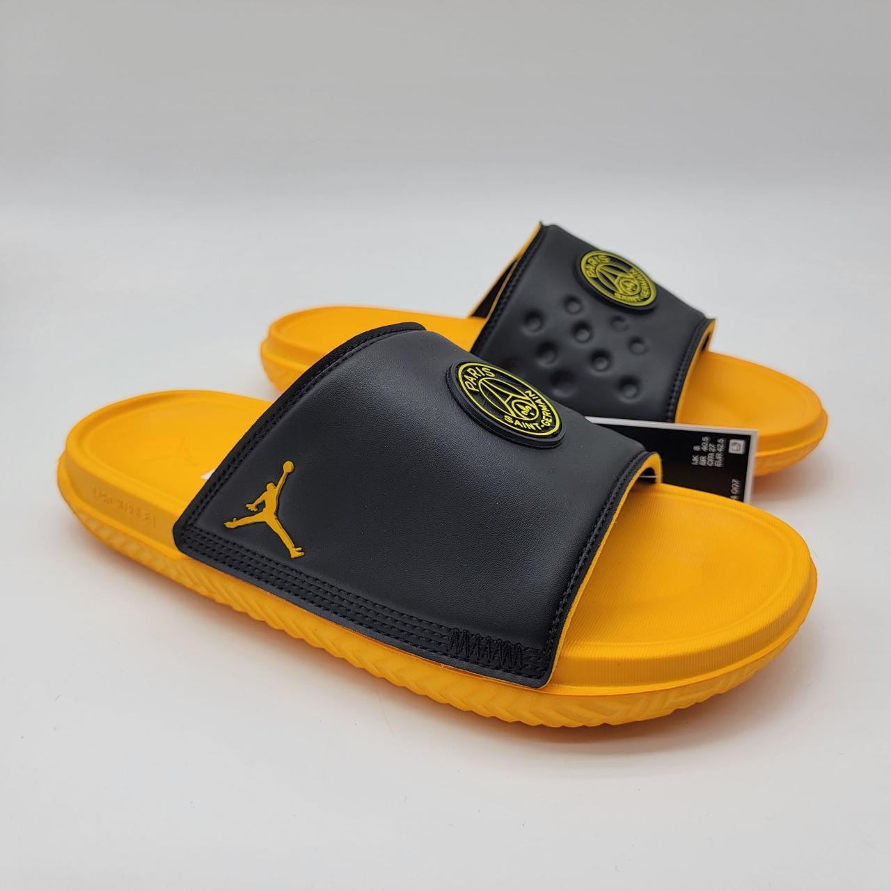 Black and shop yellow jordan slides