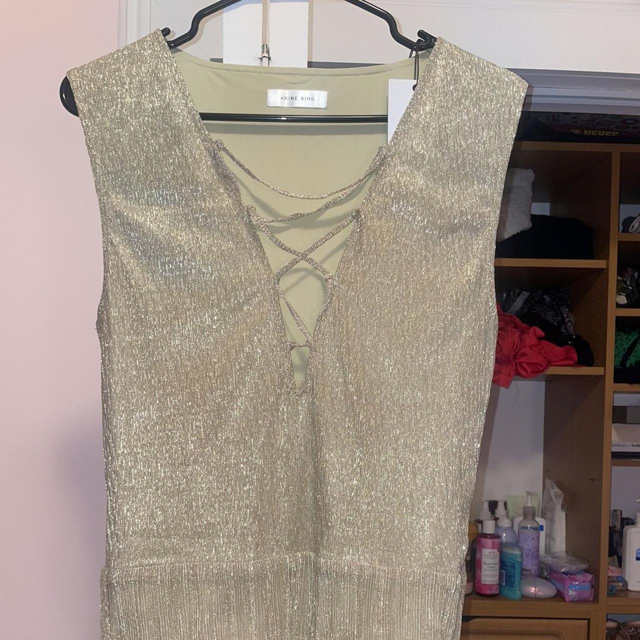 anine bing gold shimmery body suit perfect and Depop