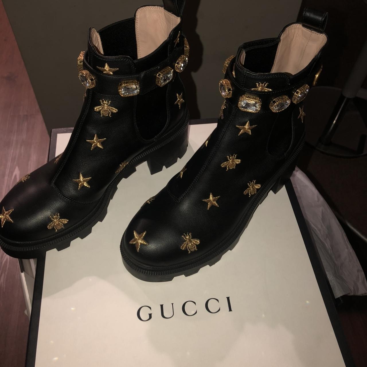 Embroidered leather ankle store boot with belt gucci