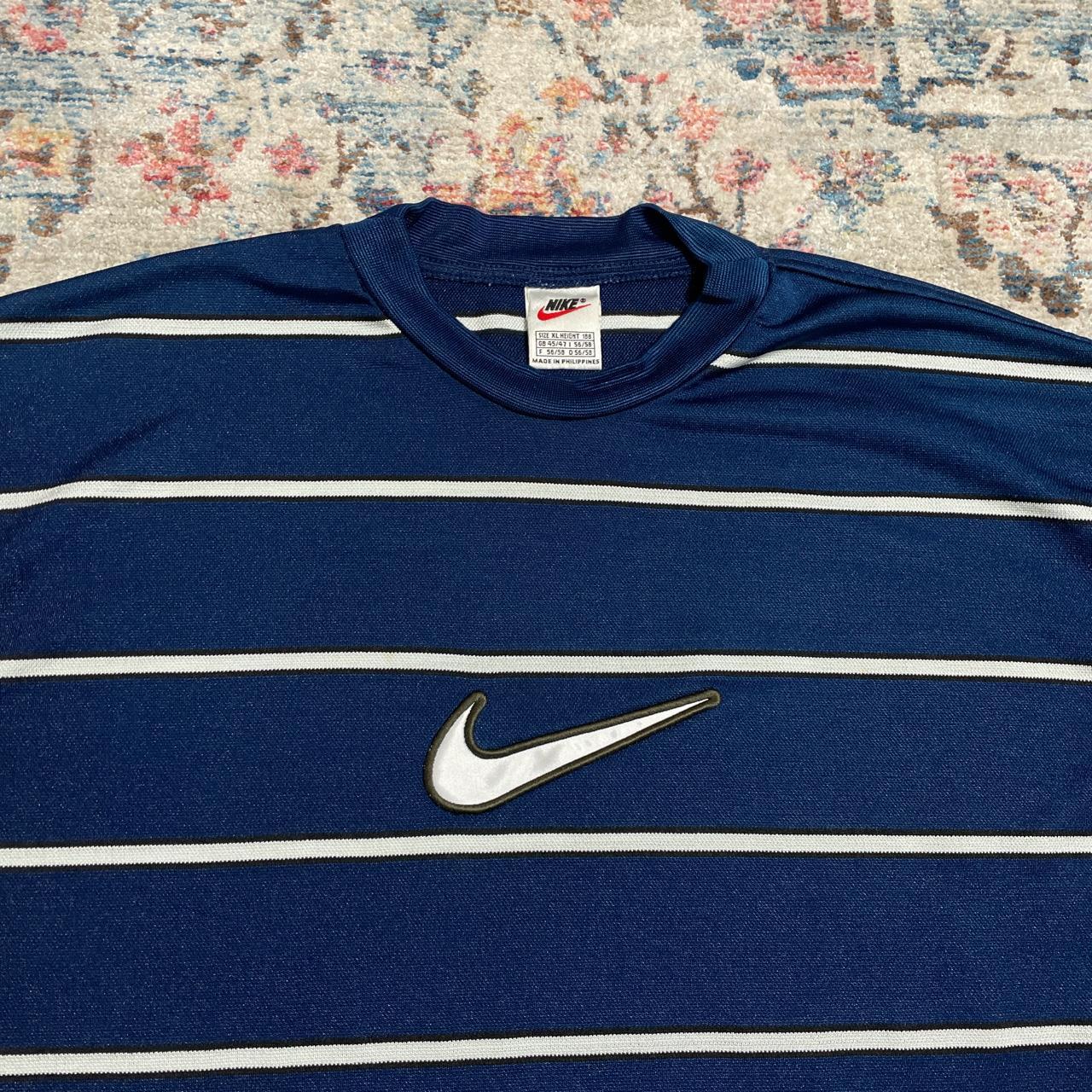 Vintage Nike navy blue centre swoosh t-shirt -... - Depop