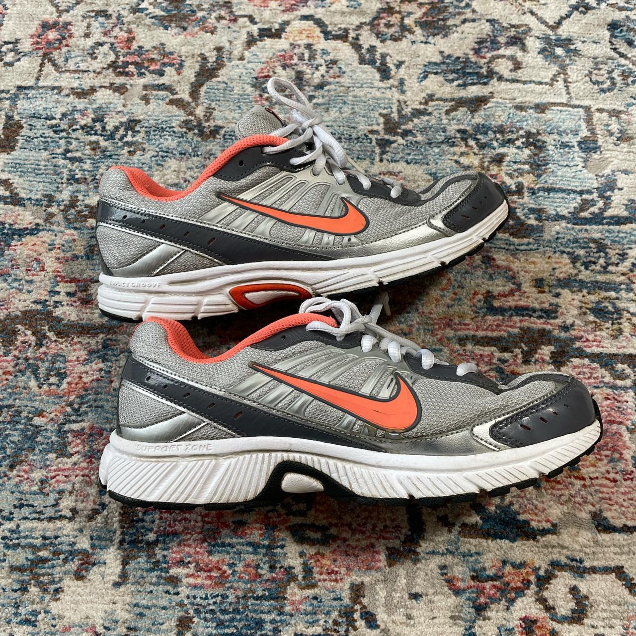 Nike impact groove running hot sale shoes