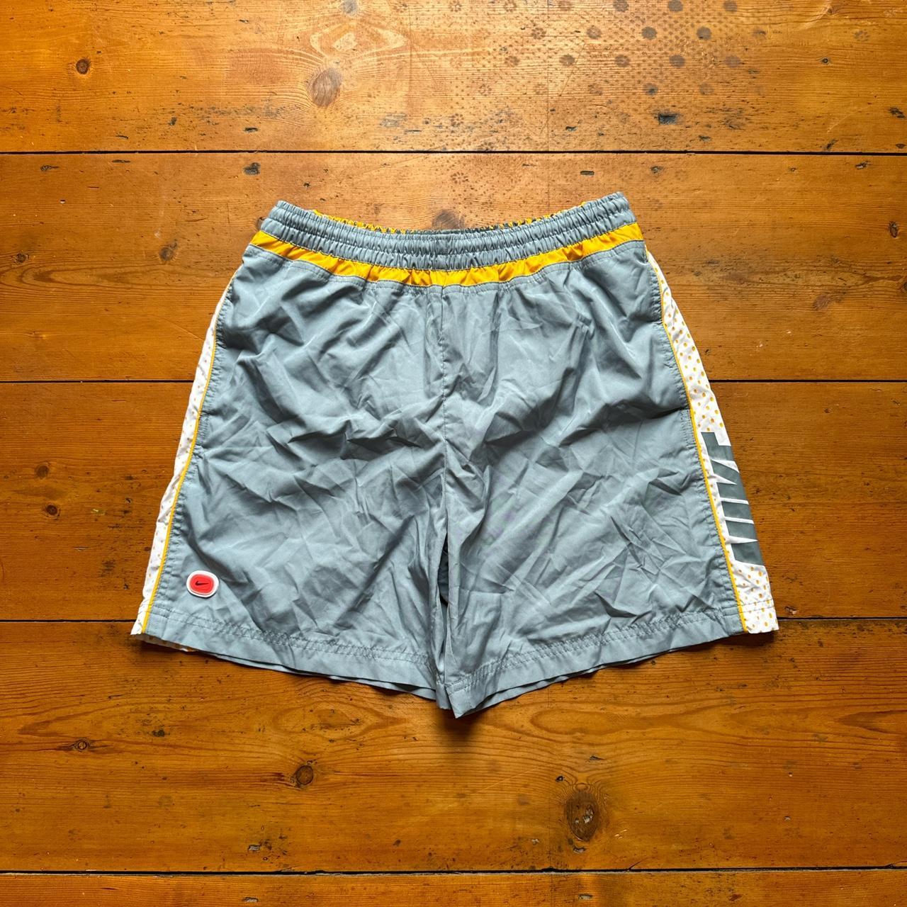 Blue and yellow nike shorts on sale