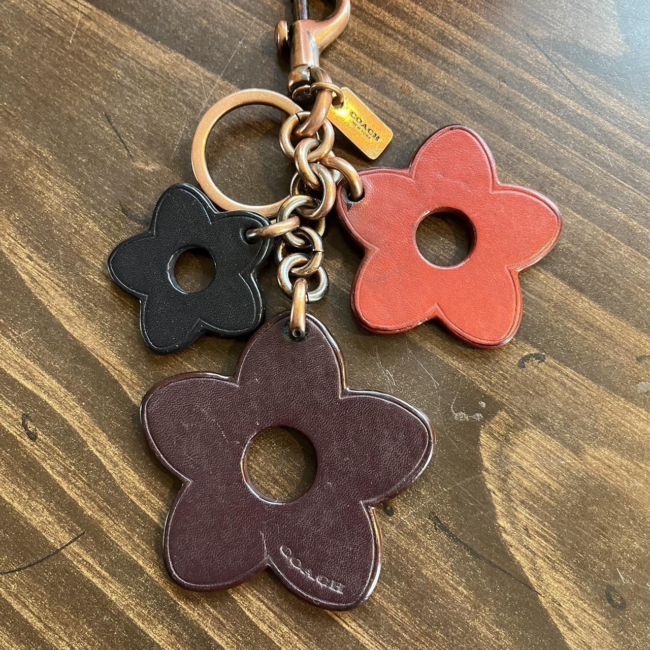 Coach leather flower keychain. This keychain has
