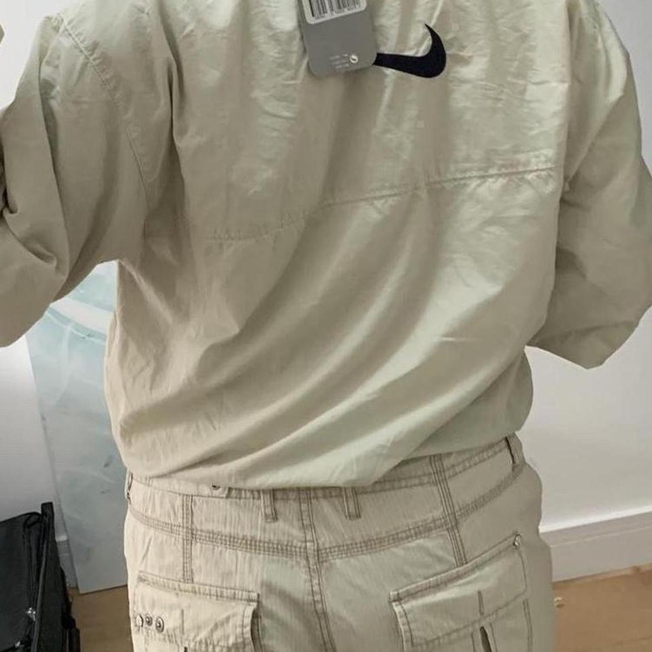 beige nike jacket