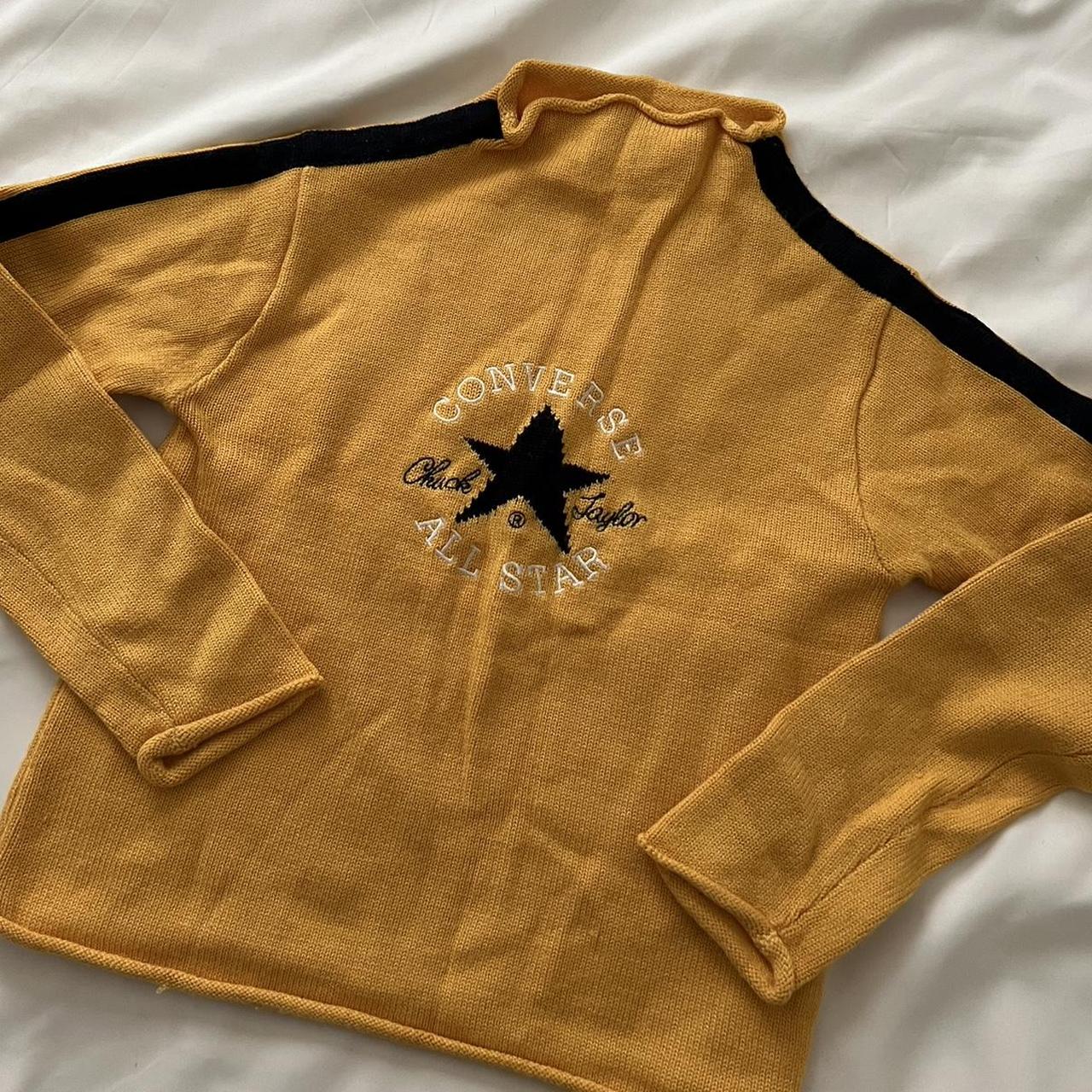 Yellow knit sweater by Converse. Unfortunately it