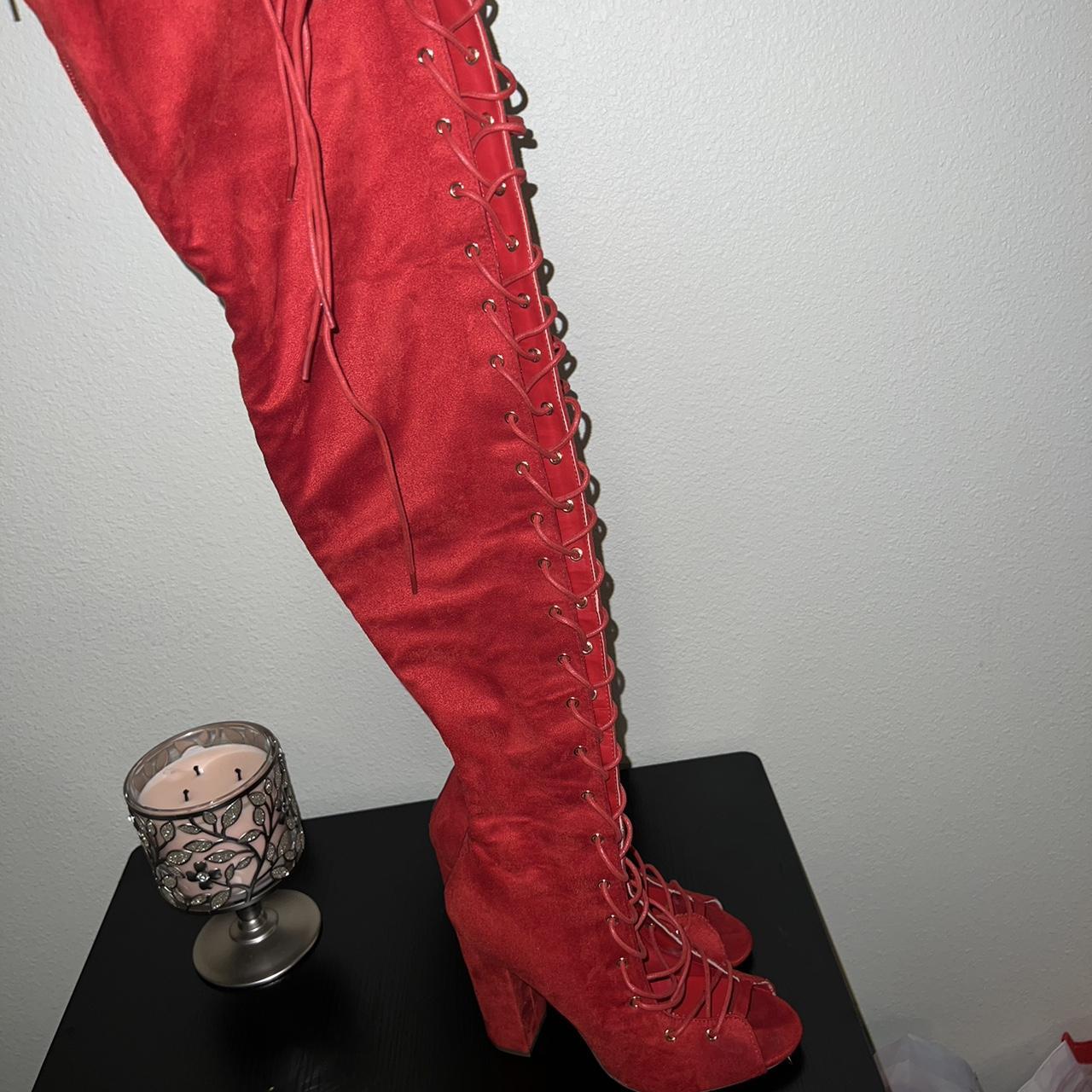 Thigh high red flat on sale boots