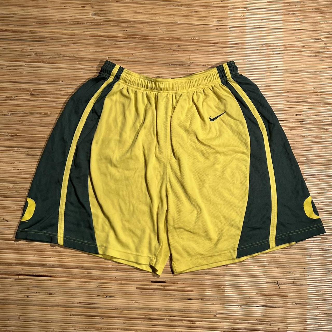 Green red shop yellow nike shorts