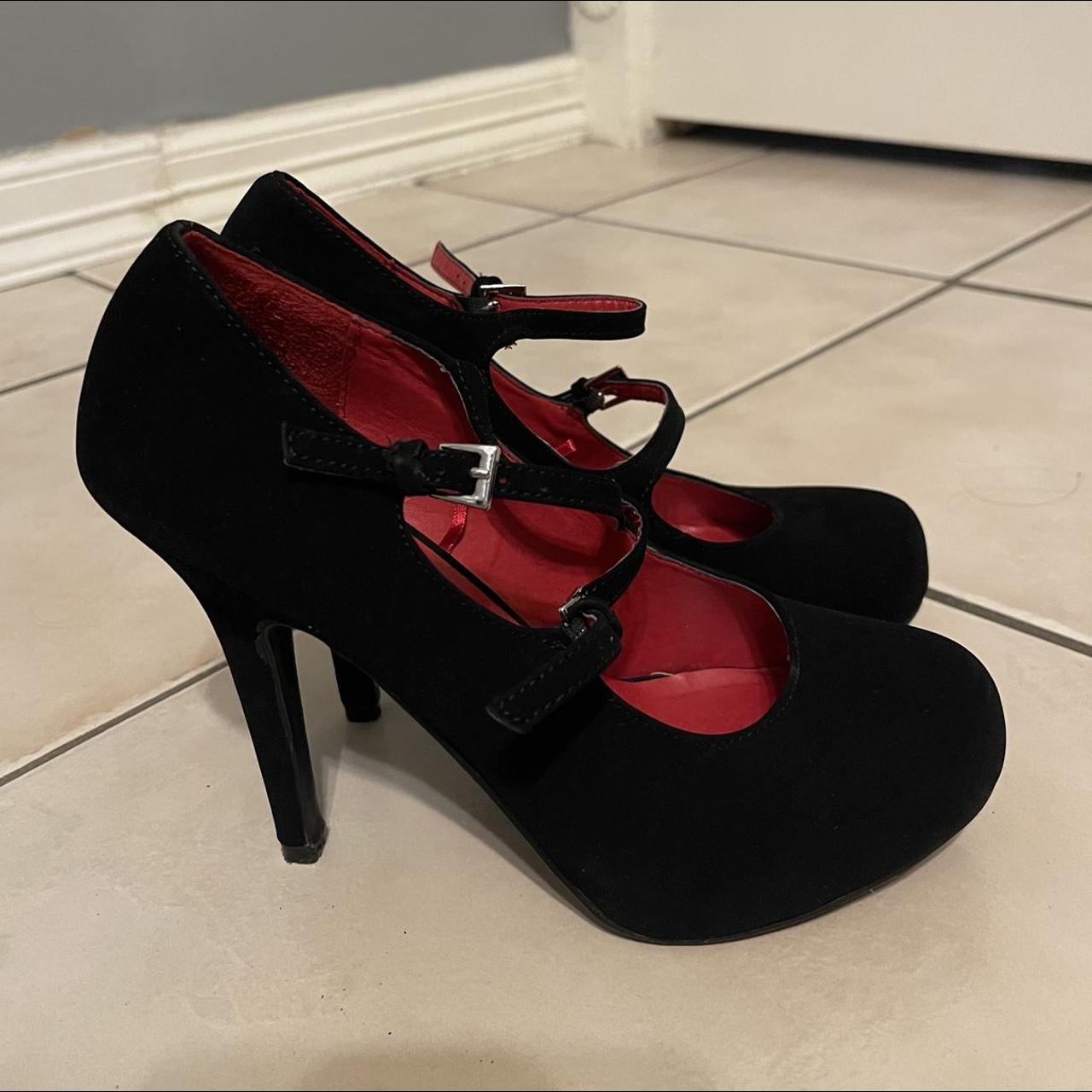 Black High Heels size 7 1 2 from Madeline Girl