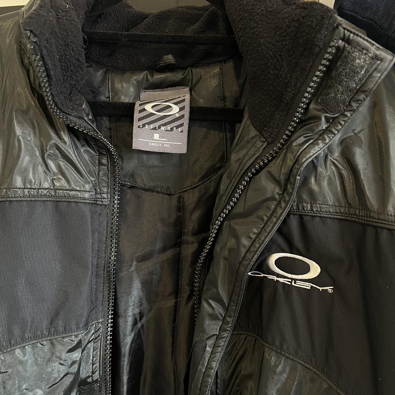 super heavy vintage oakley jacket darker black in... - Depop