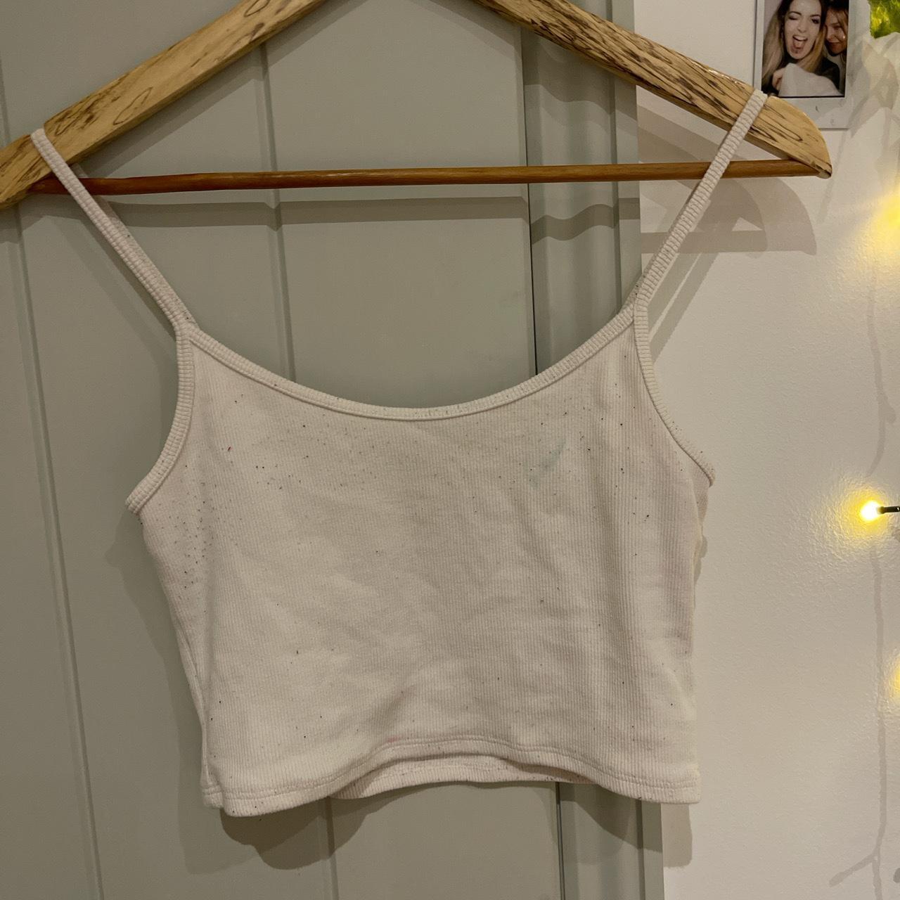 brandy melville white tank top, cami a few minor... Depop