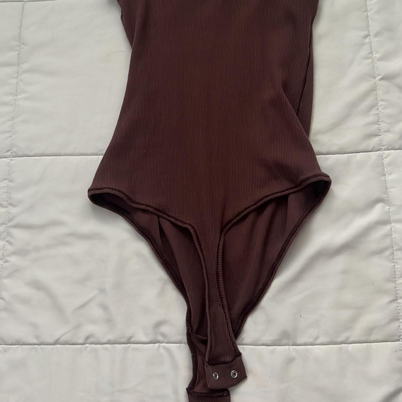 skims bodysuit 🤎 used small oil stain in the last... Depop