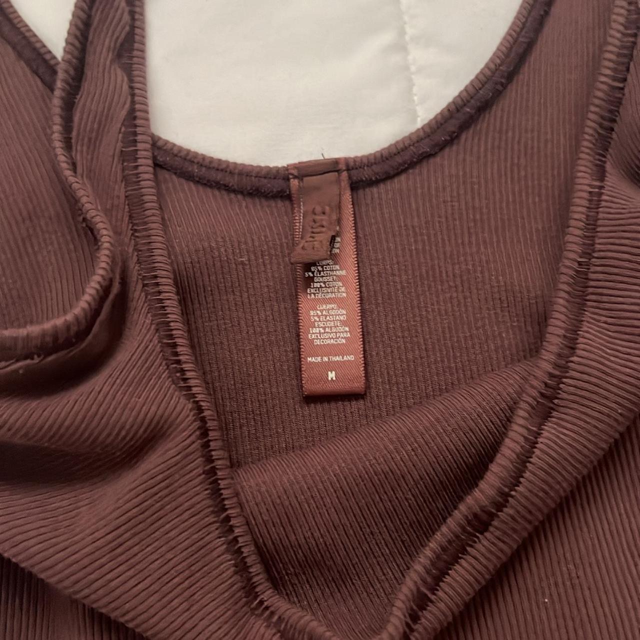 skims bodysuit 🤎 used small oil stain in the last... Depop