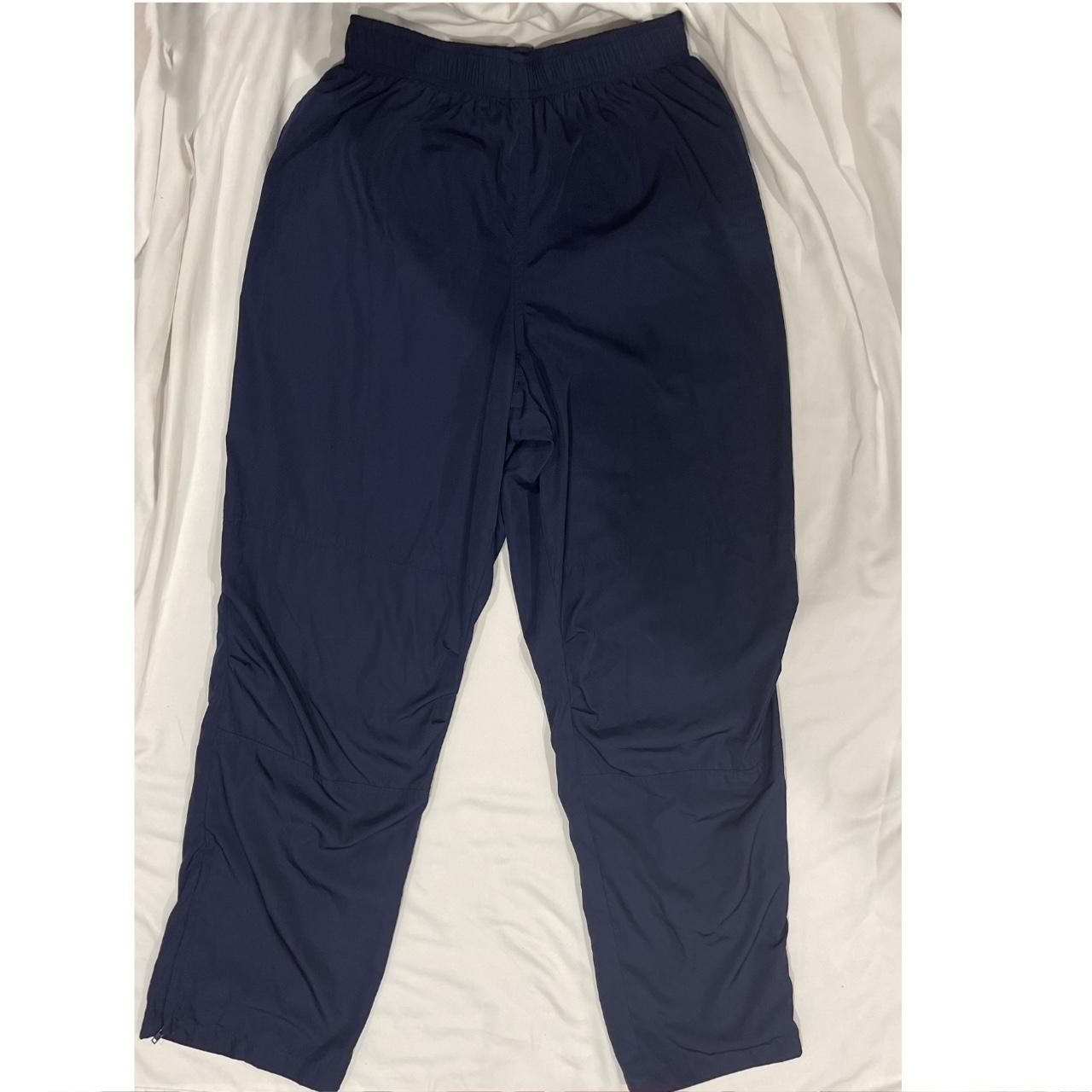Brandy Melville track pants in navy blue. Not sold... Depop