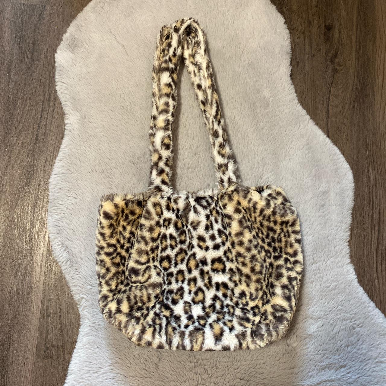 Brandy melville pink discount cheetah coin purse