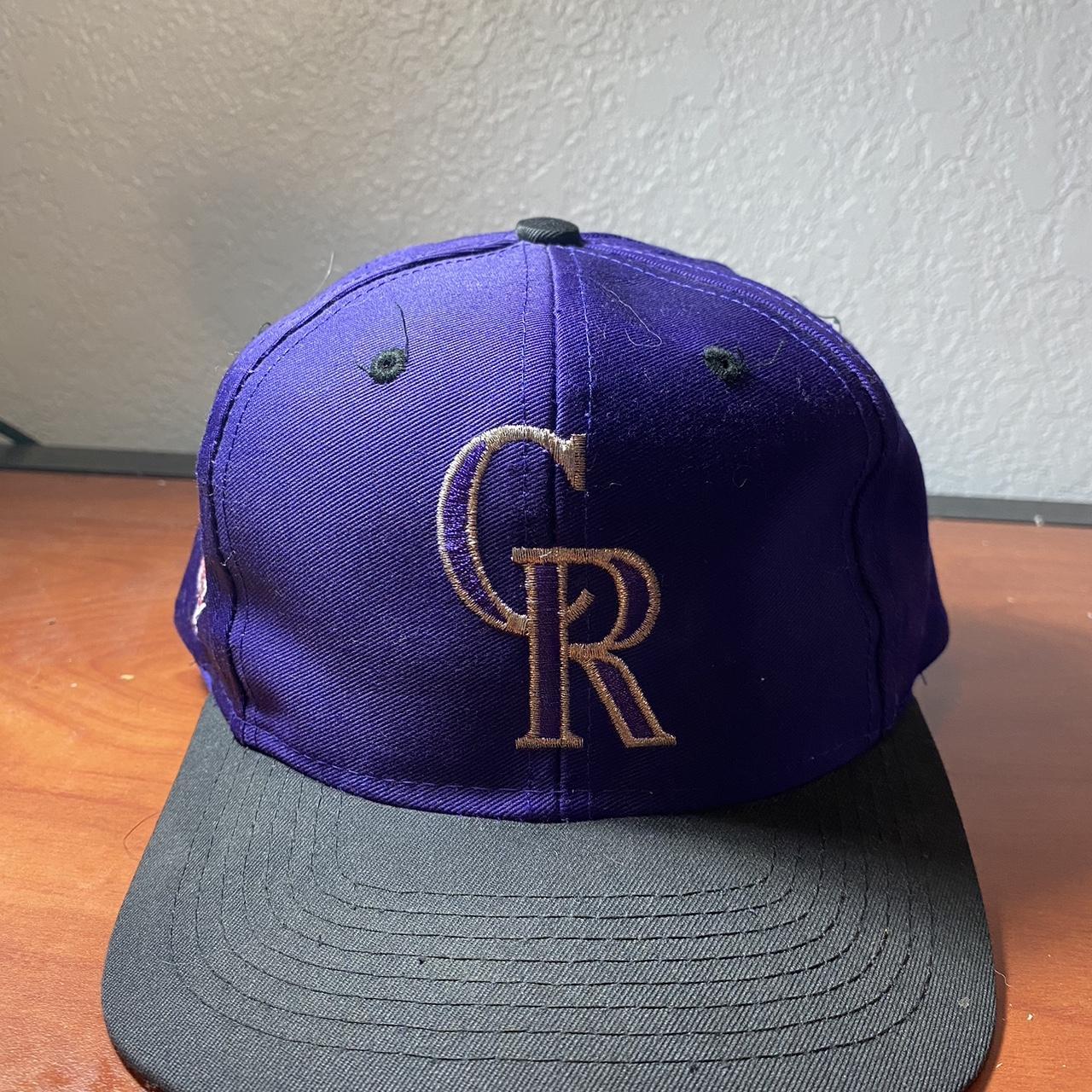 Vintage Colorado Rockies snapback hat in purple.