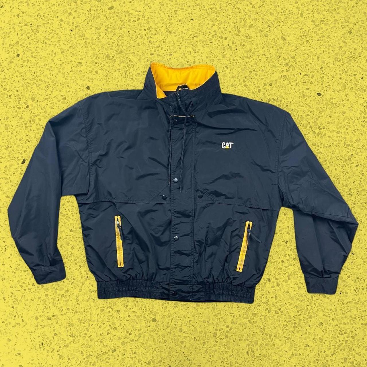 CAT Men's Black and Yellow Jacket Depop