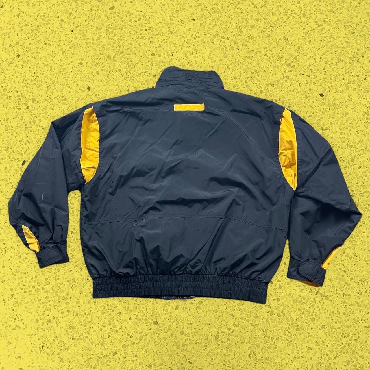 CAT Men's Black and Yellow Jacket Depop