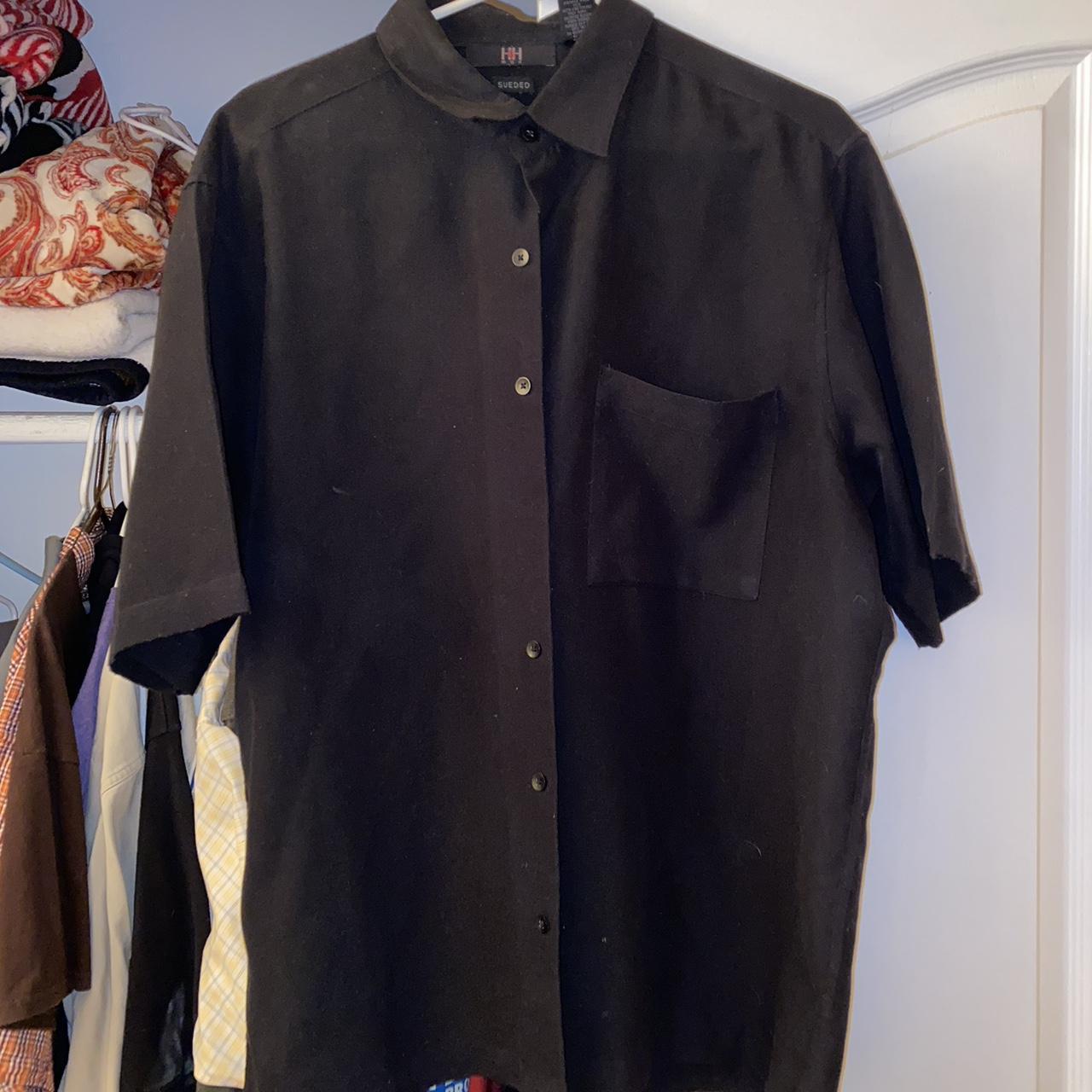 black short sleeve button up. missing a button in... - Depop