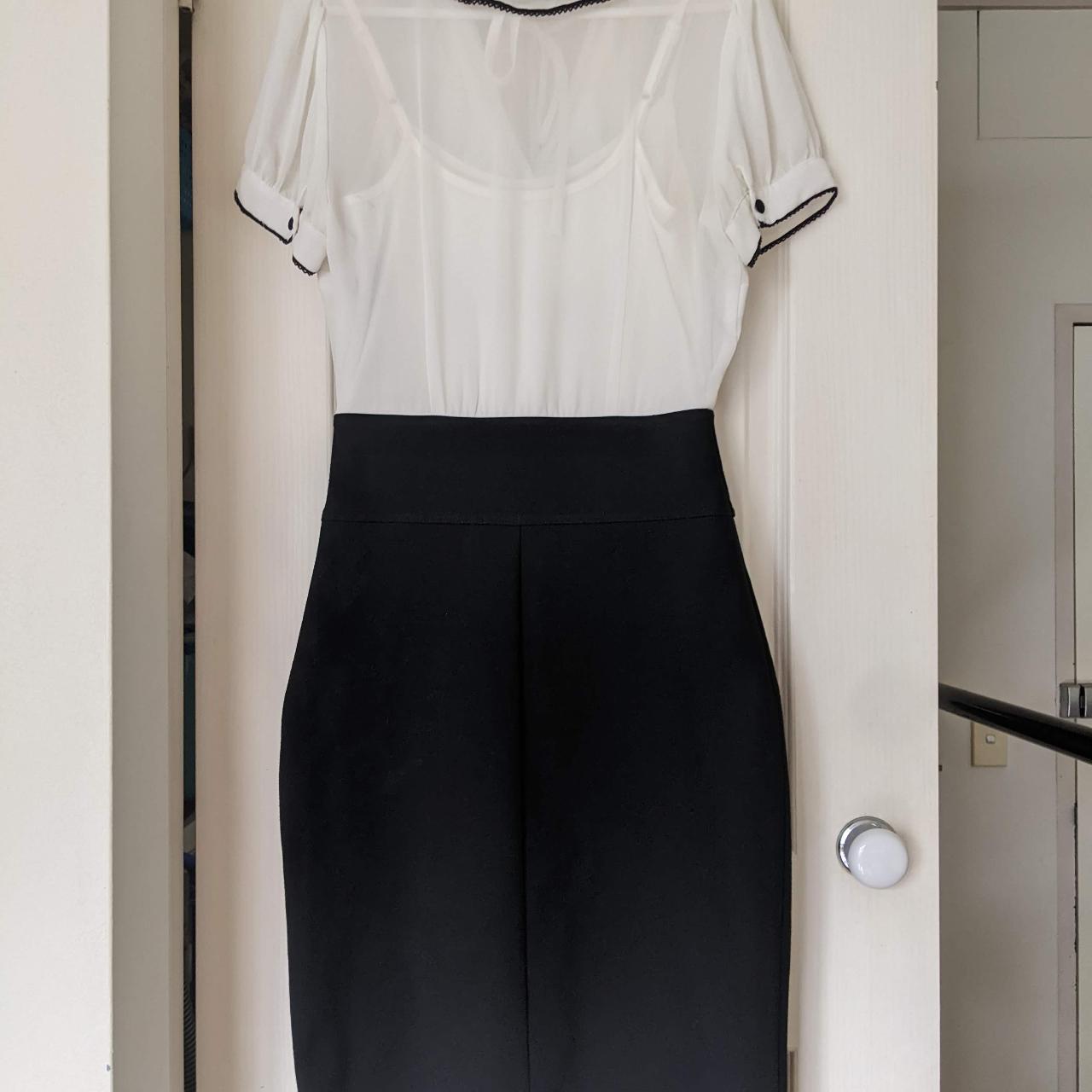 Review dress size 8. Has some light spots which I... Depop