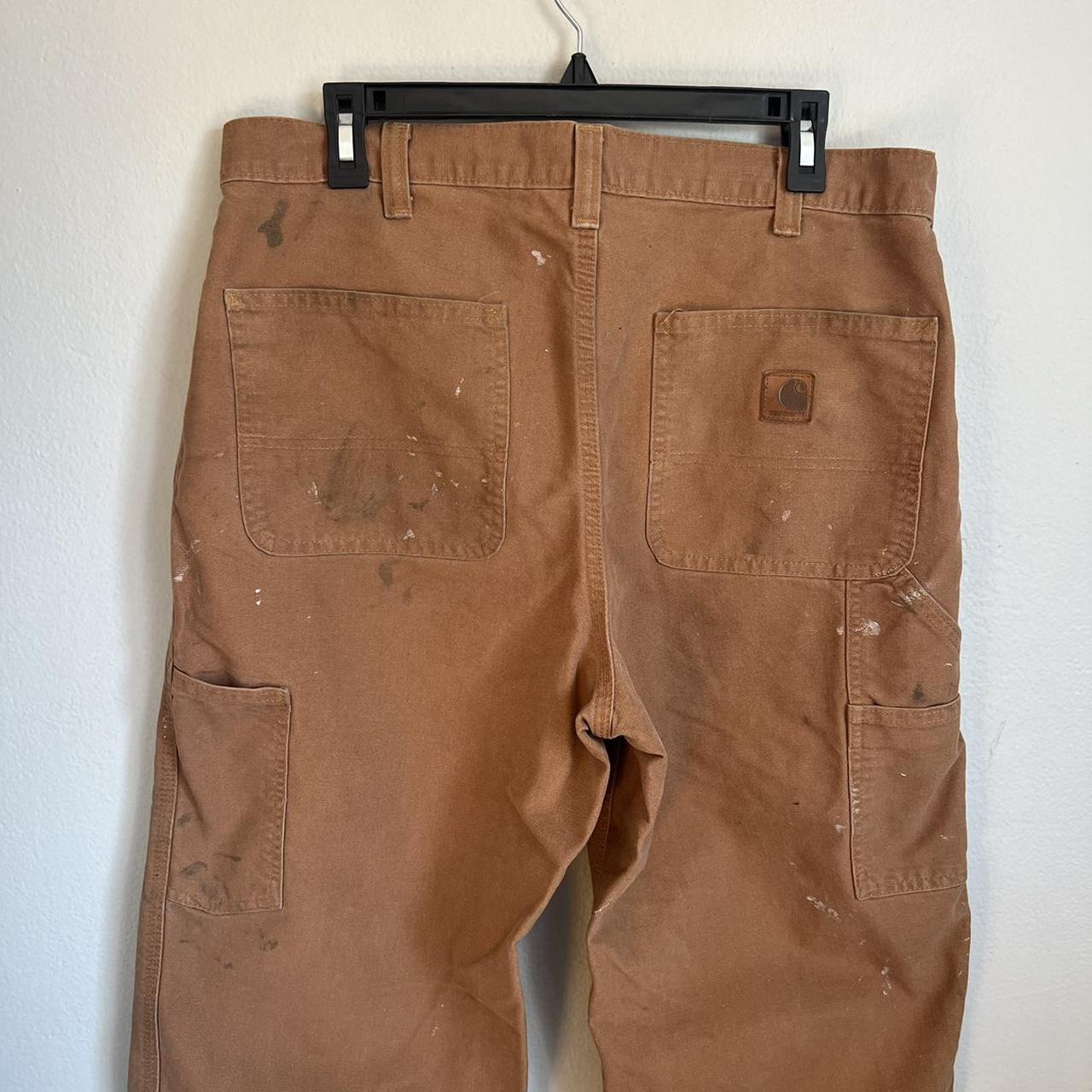 Carhartt dungaree work pants size 34 X 32 paint... Depop