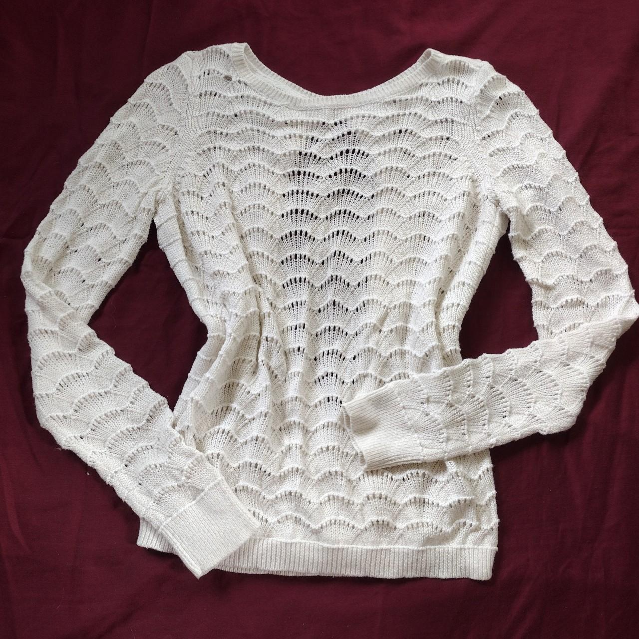 White crochet style sweater with an open back. Depop