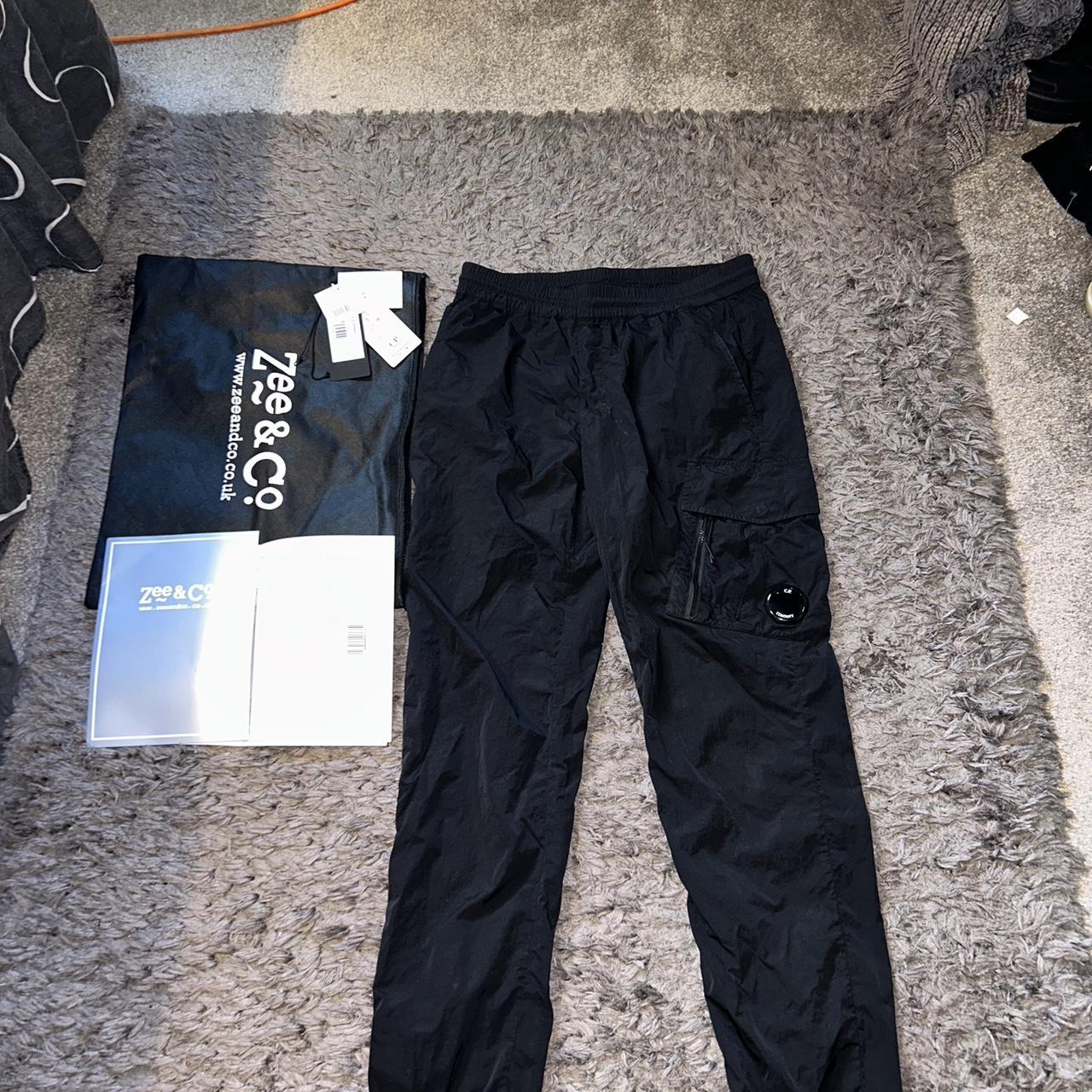 C.P company chrome cargo track pants 12year old... - Depop