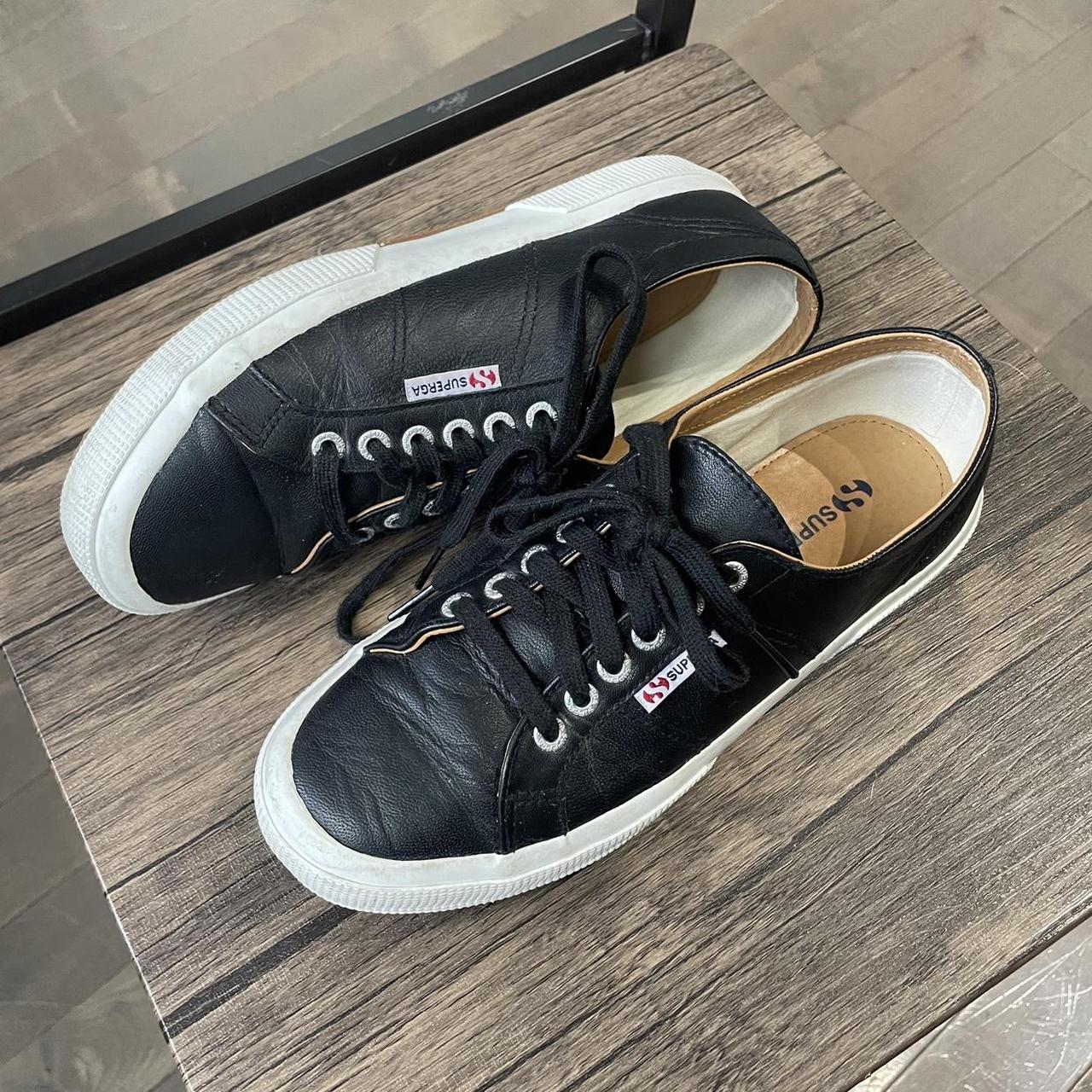 Black leather outlet supergas