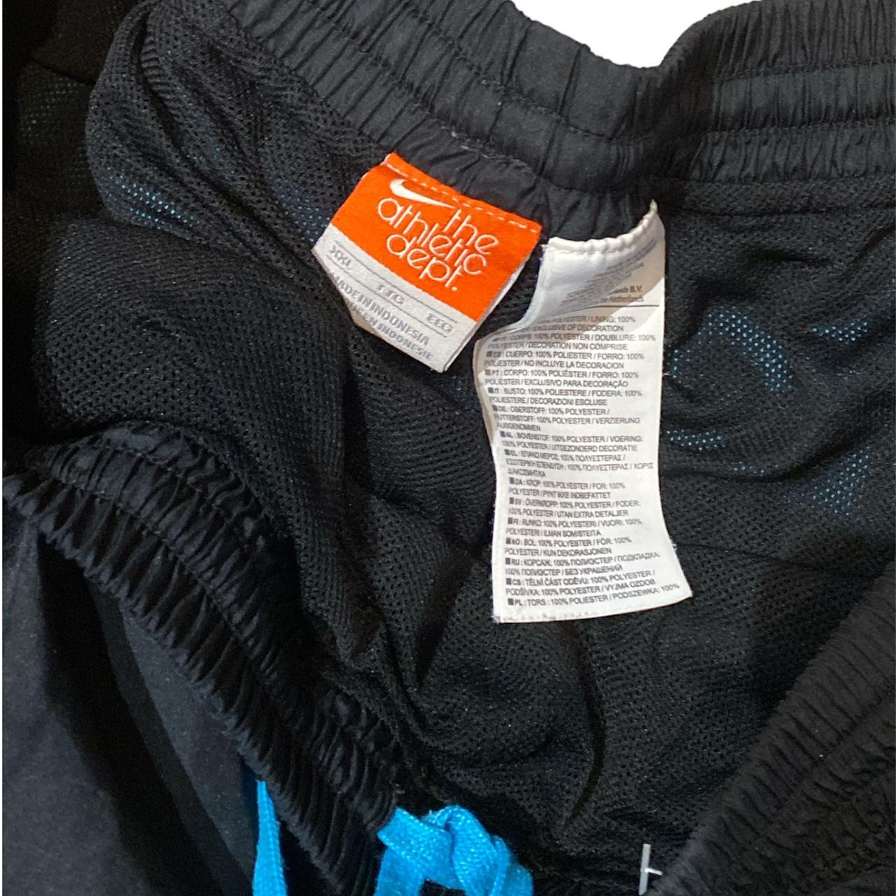 kith nike track pants