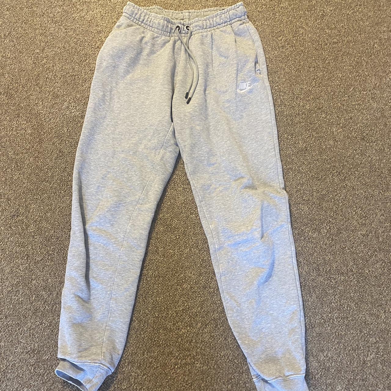 nike grey essentials joggers small flaw show in last... - Depop