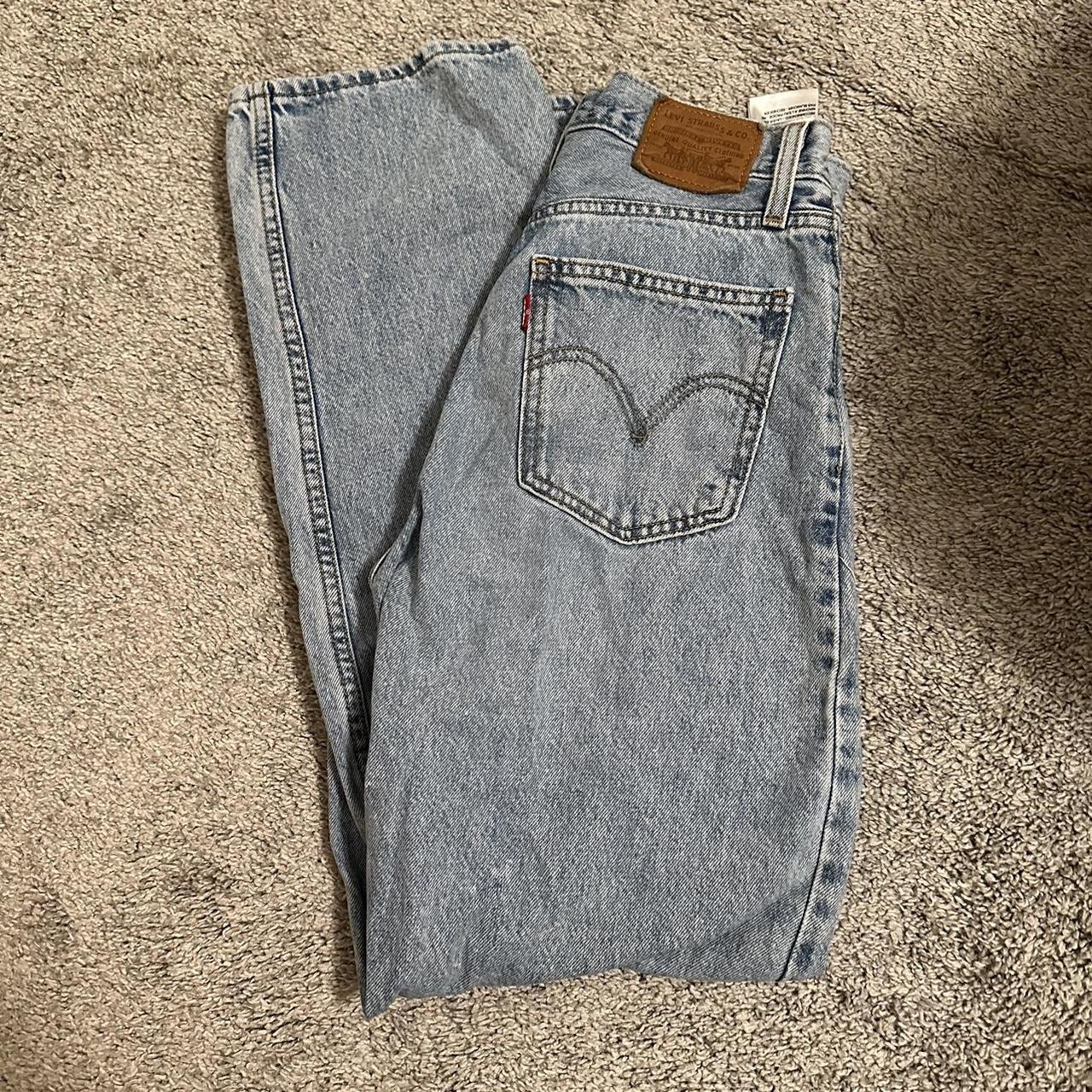 Levi’s light wash dad jean. Size 24. Small red paint... Depop