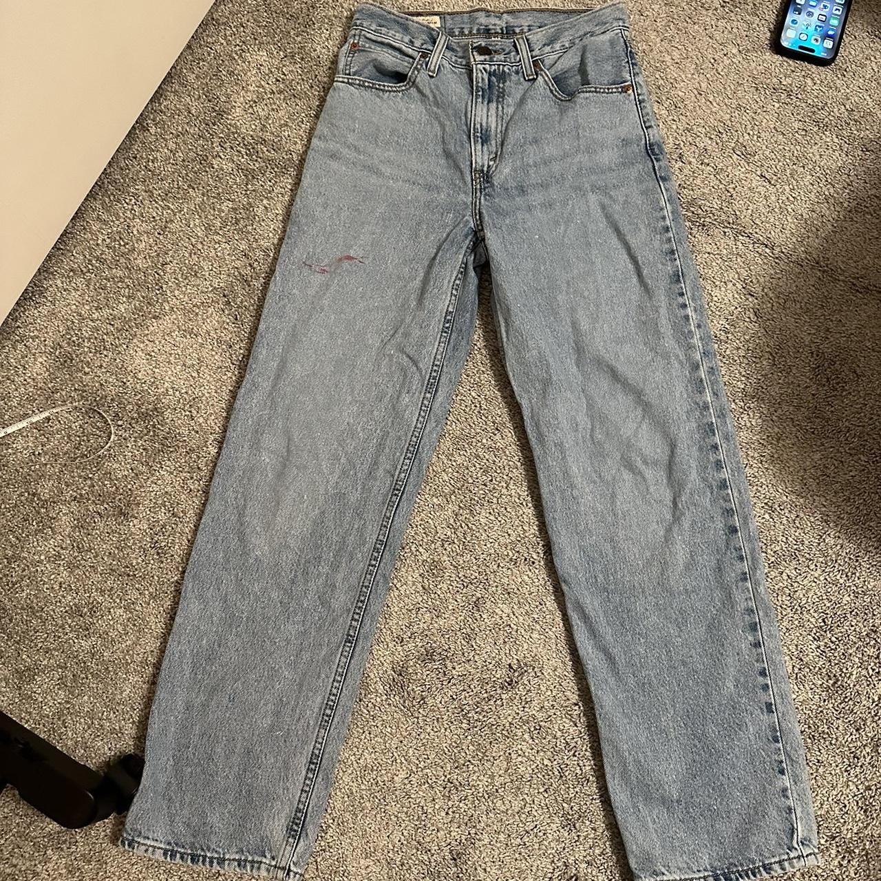 Levi’s light wash dad jean. Size 24. Small red paint... Depop